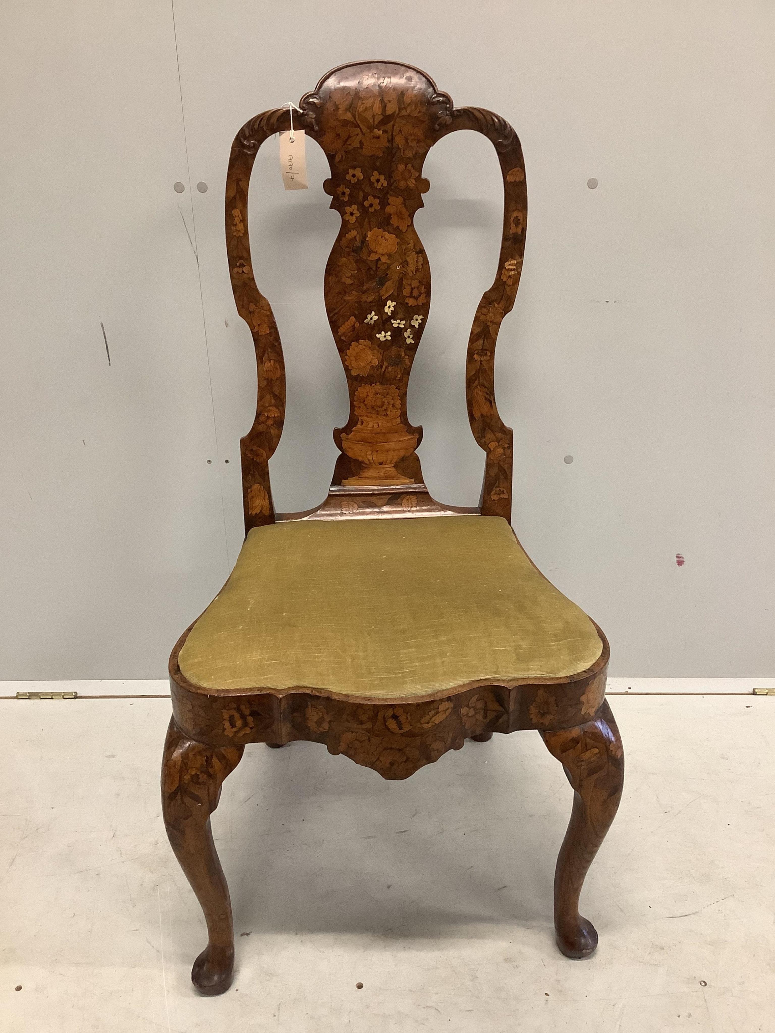 An 18th century Dutch marquetry inlaid dining chair, width 51cm, depth 41cm, height 106cm. Condition - good